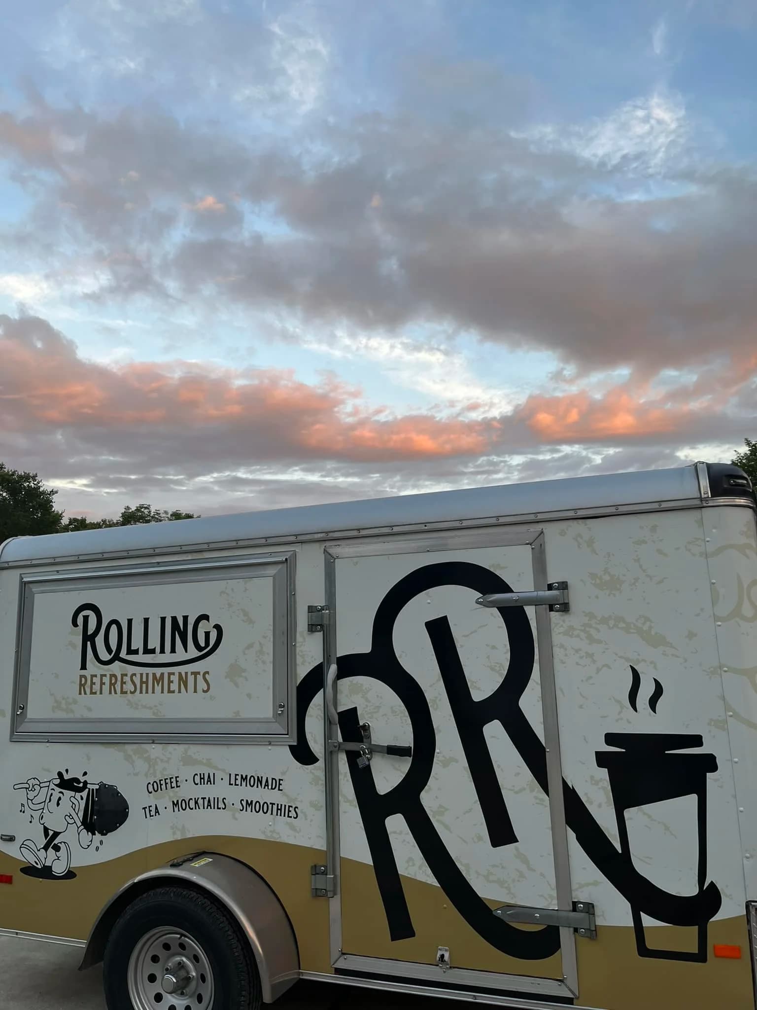 Rolling Refreshments trailer at sunset